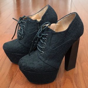 Lace up black booties